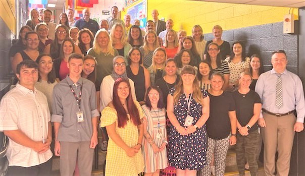 New Teachers gathered in a large group