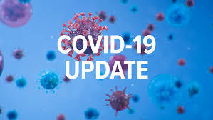 The words "Covid-19 Update" with a background that shows enlarged viral cells
