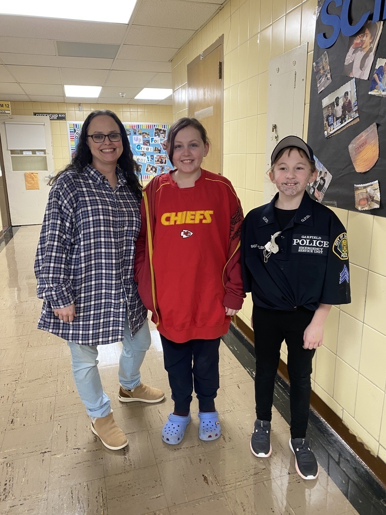 Photo of   teacher with two students It was great seeing our DBO students dressed as their favorite adults! #DBOhasHEART