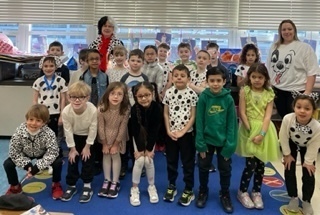 Photo of various students and teachers Celebrating 101 days of learning at Birchwood Elementary with a Dalmatians dress up theme