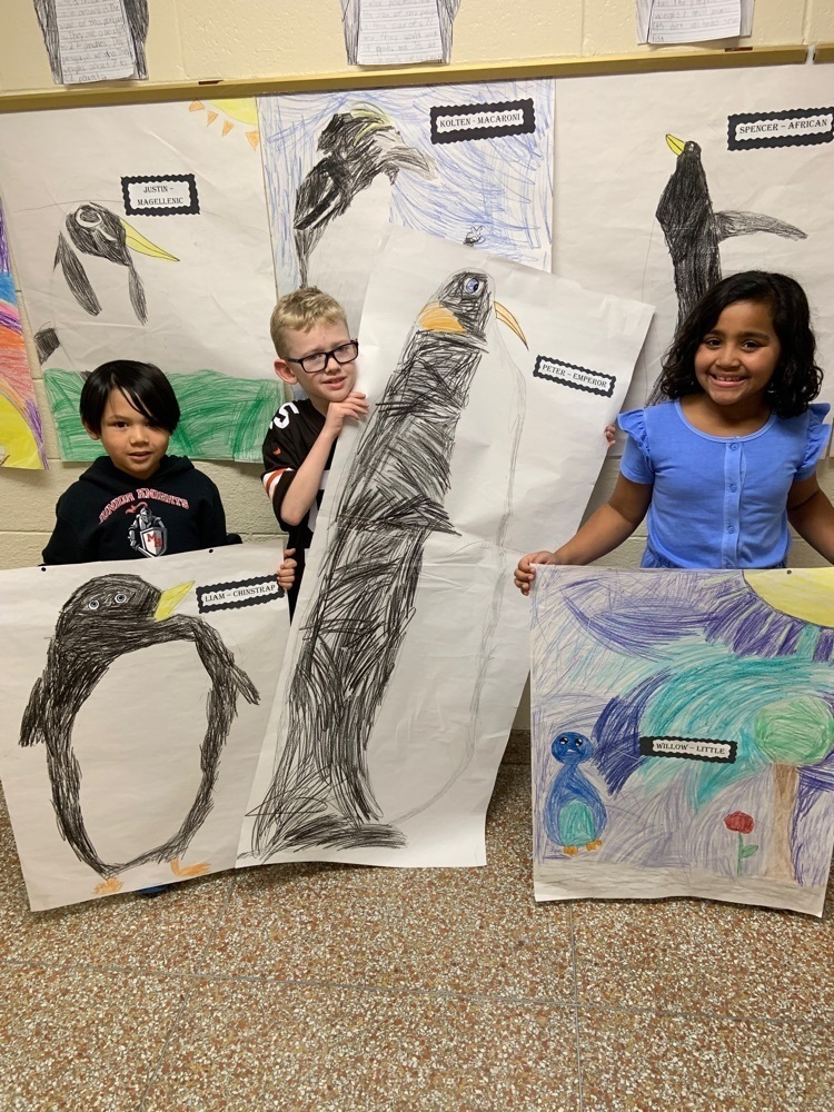 photo of 3 students posing with the life size penguin drawing Mrs. Ciak’s 2nd grade class enjoyed learning about penguins and making their own life size penguin. #SBhasHEART