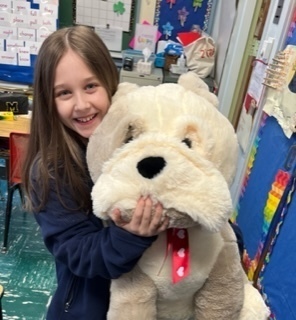 Picture of student with big fluffy stuffed animal Congratulations Mackenzie Fischer on winning the BW Lunchtime Million Dollar SHOT Basketball Game! 🏀🎉 Buster the Bulldog can't wait to give you 100,000,000 hugs! 🐶💙 #BWpride #BusterTheBulldog