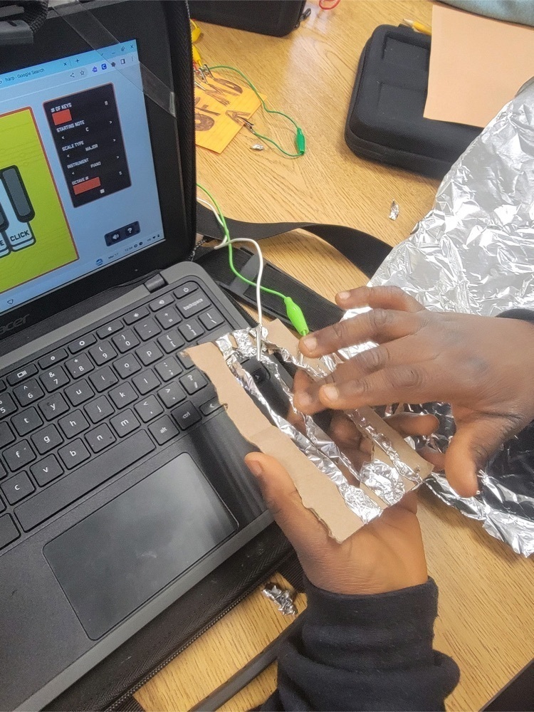 Photos of students creation of muscial instrument with Makey. Mr. Titus challenged his students to make musical instruments with Makey Makey. Check out these prototypes at Stony Brook! #coding #science #energyflow #steam