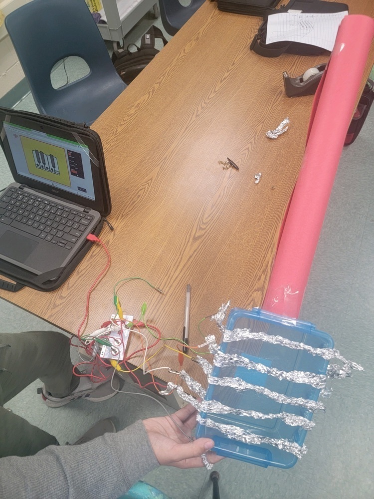 Photos of students creation of muscial instrument with Makey. Mr. Titus challenged his students to make musical instruments with Makey Makey. Check out these prototypes at Stony Brook! #coding #science #energyflow #steam