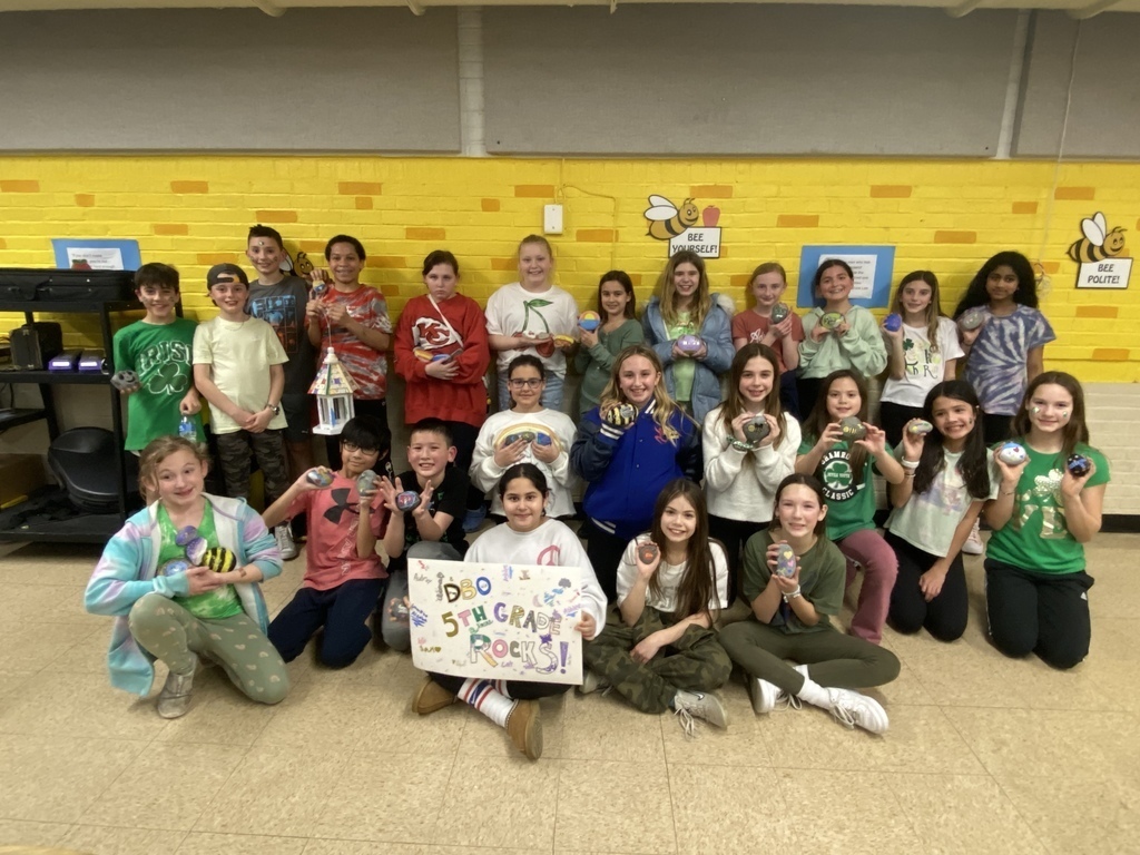 5th graders pictures with their colorful rocks